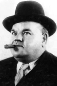 Photo of Dick Henderson as Mr. Tidmarsh
