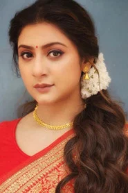 Photo of Swikriti Majumder as Purna Chatterjee Roy