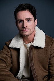 Photo of Paul Hughes as Tom