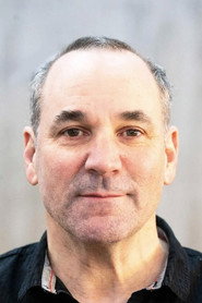 Photo of Alex Poch-Goldin as Travis