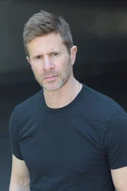 Photo of David Ojalvo as Davies