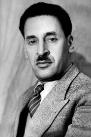 Photo of Ferhat Abbas as Self - President of the Algerian Republic (archive footage)