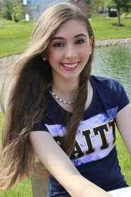 Photo of Faith Rosalie Dunn as Leslie McLean