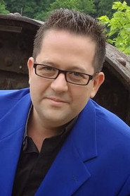 Photo of Doc Benson as The Priest