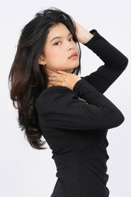 Photo of Reina Moore as Anggi