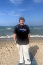 Photo of Joey Syron as Georgia / The Twin / News Anchor