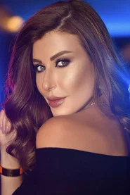 Photo of Rita Harb as Joel Harb