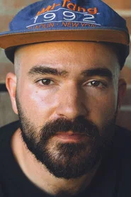 Photo of Michael J. Ahern as Adrian