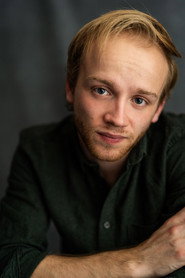 Photo of Simon Bigg as Ethan
