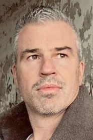 Photo of Allard Geerlings as Federal Agent Swett