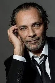Photo of Jean-Louis Loca as Rafik