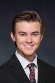 Photo of Justin Eckert as Roy