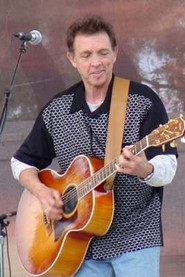 Photo of Michael Woods as Guitars