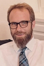 Photo of Nathan Austin as The Pricemaster