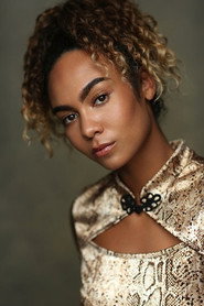 Photo of Holly Liburd as Earth