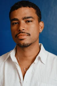 Photo of Luciano Pedro Jr. as Luciano