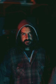 Photo of Tam Ali as Bass