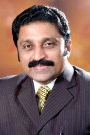 Photo of Mohan Ayroor as Dr. Moorthi