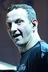 Photo of Darrin Mooney as Drums