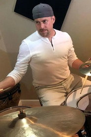 Photo of Brian Dunne as Drums