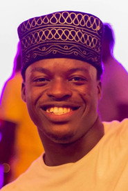 Photo of Enumah Oliseh as Colos