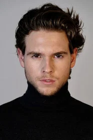 Photo of Parker Little as Denny Carson