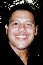 Photo of Tony Gomez as Father Townsend