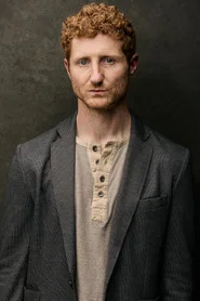 Photo of P.K. Simone as Roy