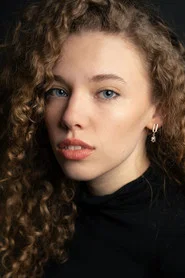 Photo of Emily Marszalek as Riley