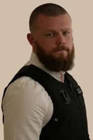 Photo of Luke Peacock as Enforcement Agent