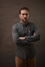 Photo of Taras Valihura as Béla, Eva's Father