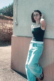 Photo of Emmie Palisse as Iris Lambert