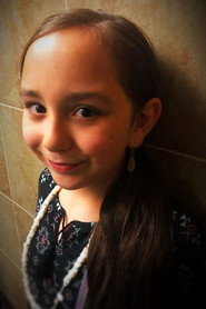 Photo of Annabella Binaakwe as Young Jim