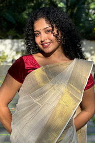 Photo of Carmen S Mathew as Kuruvi 'Nitro Kili'