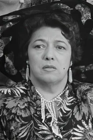 Photo of Louisette Rousseau as Roland's concierge