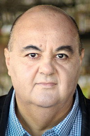 Photo of John Samaha as Fartouk Hamesh