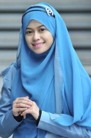 Photo of Heliza Helmi as Siti