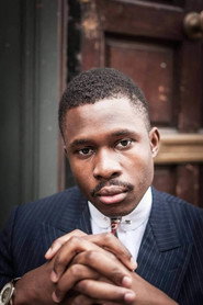 Photo of Tomisin Adepeju as Guard