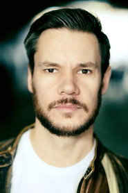 Photo of Jonathan Scholey as Roger