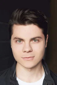 Photo of Atticus Mitchell as Benny
