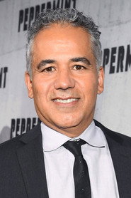 Photo of John Ortiz as Hewey