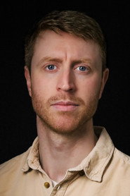 Photo of Corey Millar as Receptionist