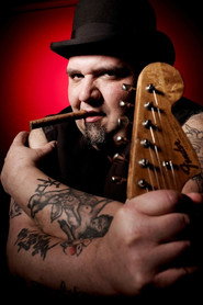 Photo of Popa Chubby as Guitar