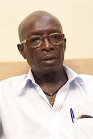 Photo of Umban U'kset as Mr. Umba, François' African neighbor
