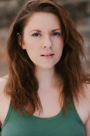 Photo of Jeni Bezuidenhout as Camile (Receptionist)