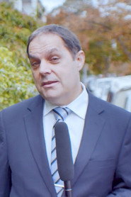 Photo of Mark Robert Walters as Man in Suit