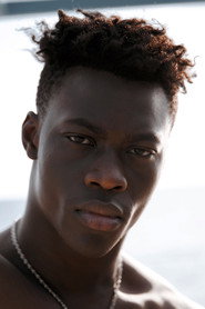 Photo of Emmanuel Elozieuwa as Kosmas