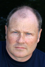 Photo of John Deignan as Dr. Grant