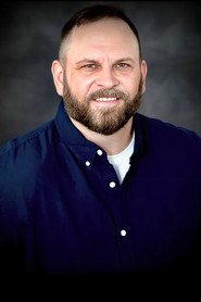 Photo of Christopher Determan as Prisoner 2