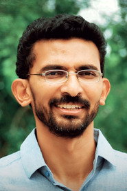 Photo of Sekhar Kammula as Kotigadu (Voice)